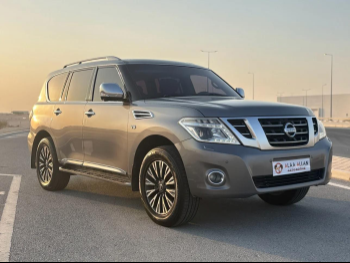 Nissan  Patrol  Platinum  2014  Automatic  263,500 Km  8 Cylinder  Four Wheel Drive (4WD)  SUV  Gray