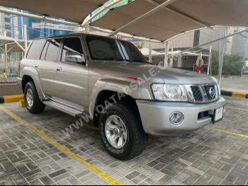 Nissan  Patrol  Safari  2022  Manual  56,500 Km  8 Cylinder  Four Wheel Drive (4WD)  SUV  Silver  With Warranty