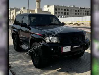 Nissan  Patrol  Safari  2016  Automatic  202,000 Km  6 Cylinder  Four Wheel Drive (4WD)  SUV  Black