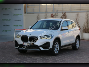 BMW  X-Series  X1  2022  Automatic  39,000 Km  4 Cylinder  Front Wheel Drive (FWD)  SUV  White  With Warranty