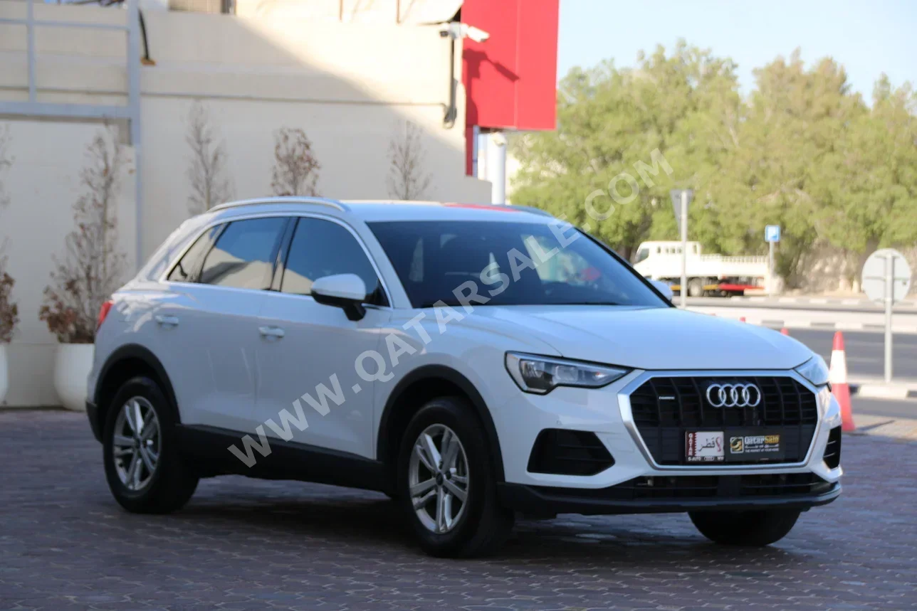 Audi  Q3  40 TFSI Quattro  2022  Automatic  18,300 Km  4 Cylinder  All Wheel Drive (AWD)  SUV  White  With Warranty