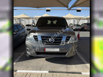 Nissan  Patrol  Platinum  2014  Automatic  132,500 Km  8 Cylinder  Four Wheel Drive (4WD)  SUV  Silver  With Warranty
