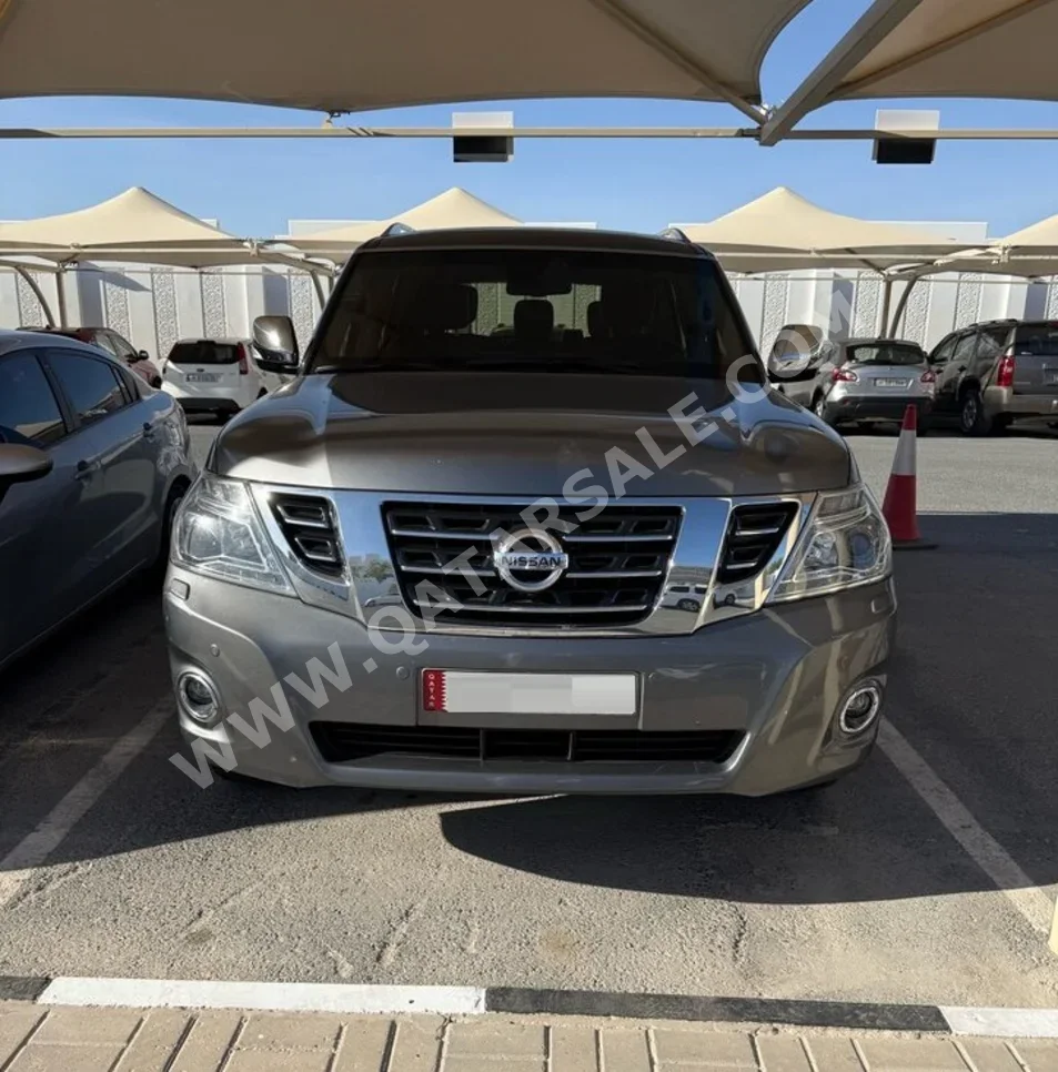 Nissan  Patrol  Platinum  2014  Automatic  132,500 Km  8 Cylinder  Four Wheel Drive (4WD)  SUV  Silver  With Warranty