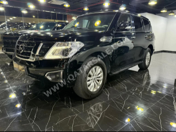 Nissan  Patrol  SE  2015  Automatic  135,000 Km  8 Cylinder  Four Wheel Drive (4WD)  SUV  Black