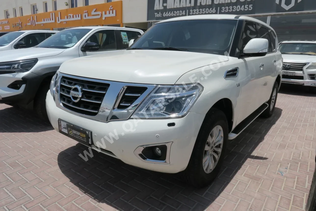Nissan  Patrol  SE  2016  Automatic  207,000 Km  8 Cylinder  Four Wheel Drive (4WD)  SUV  White