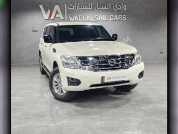 Nissan  Patrol  XE  2019  Automatic  153,000 Km  6 Cylinder  Four Wheel Drive (4WD)  SUV  White