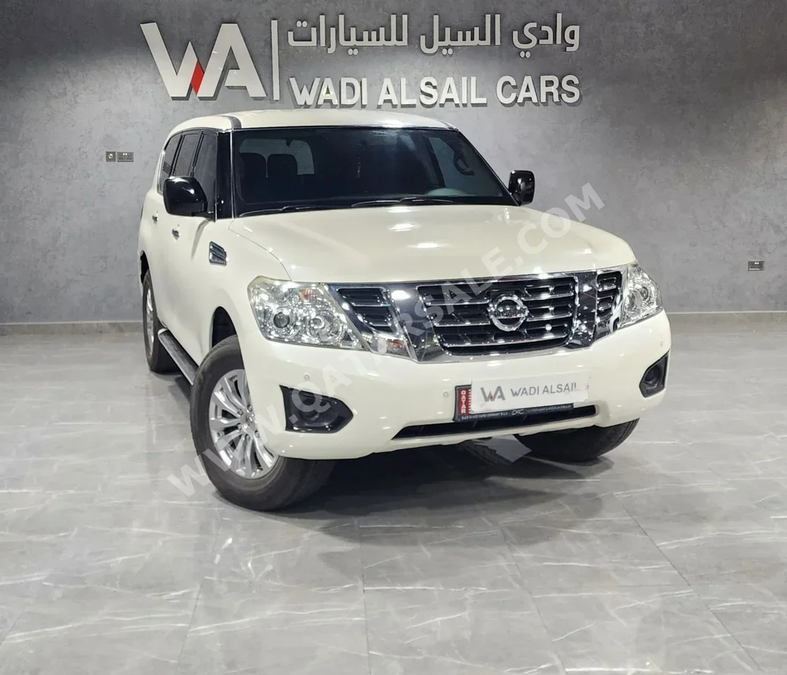 Nissan  Patrol  XE  2019  Automatic  153,000 Km  6 Cylinder  Four Wheel Drive (4WD)  SUV  White