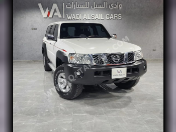 Nissan  Patrol  GL  2019  Automatic  147,000 Km  6 Cylinder  Rear Wheel Drive (RWD)  SUV  White