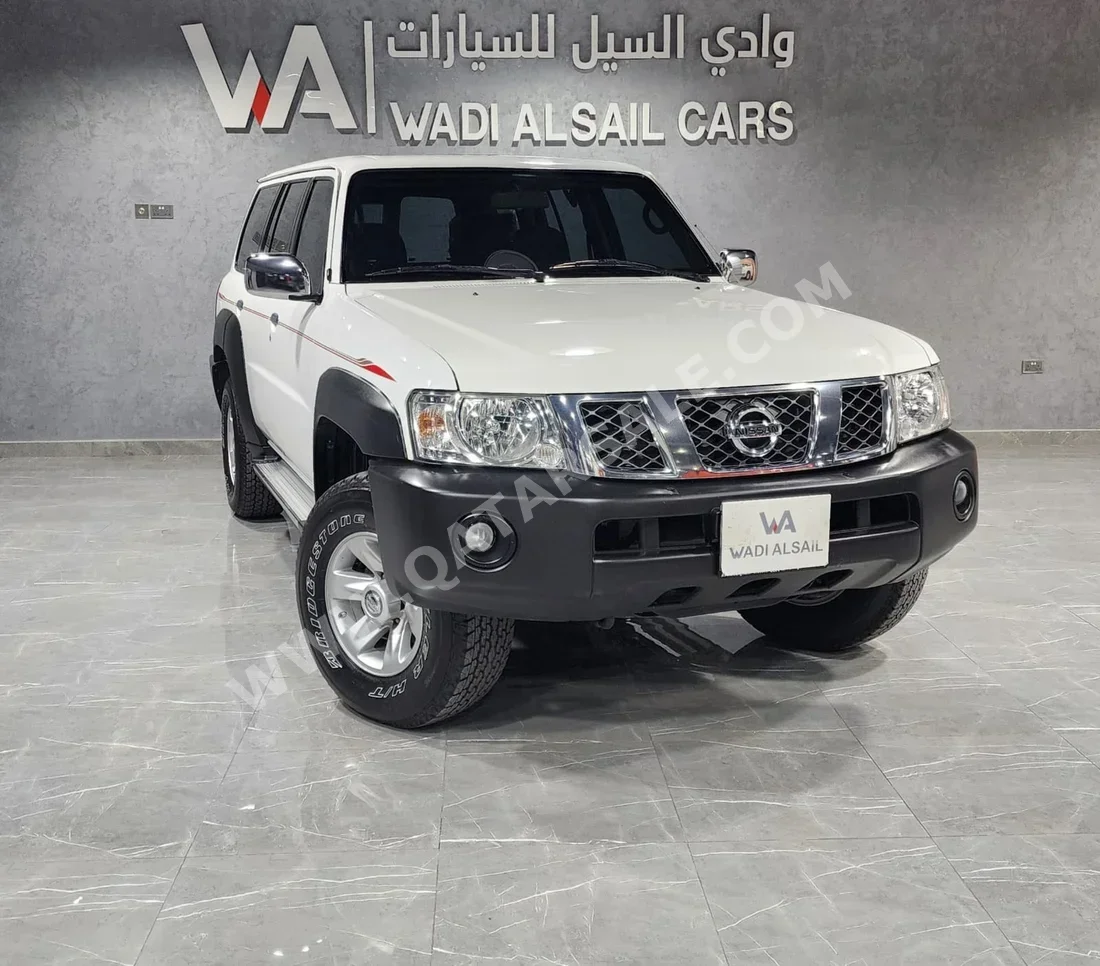 Nissan  Patrol  GL  2019  Automatic  147,000 Km  6 Cylinder  Rear Wheel Drive (RWD)  SUV  White