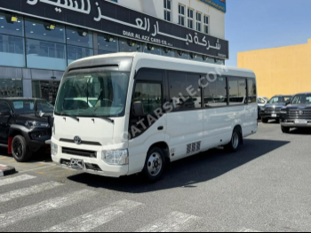 Toyota  Coaster  2020  Manual  105,000 Km  4 Cylinder  Rear Wheel Drive (RWD)  Van / Bus  White