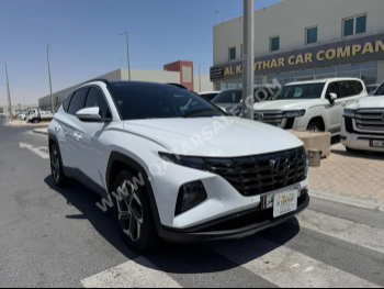 Hyundai  Tucson  2022  Automatic  75,000 Km  4 Cylinder  Front Wheel Drive (FWD)  SUV  White  With Warranty