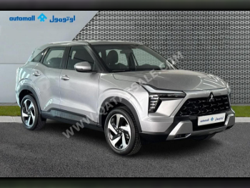 Mitsubishi  XForce  2025  Automatic  524 Km  4 Cylinder  Front Wheel Drive (FWD)  SUV  Silver  With Warranty