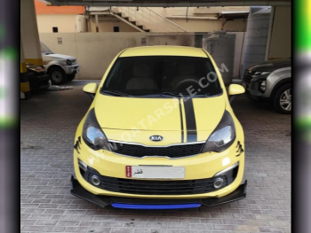 Kia  Rio  2017  Automatic  190,000 Km  4 Cylinder  Front Wheel Drive (FWD)  Hatchback  Yellow