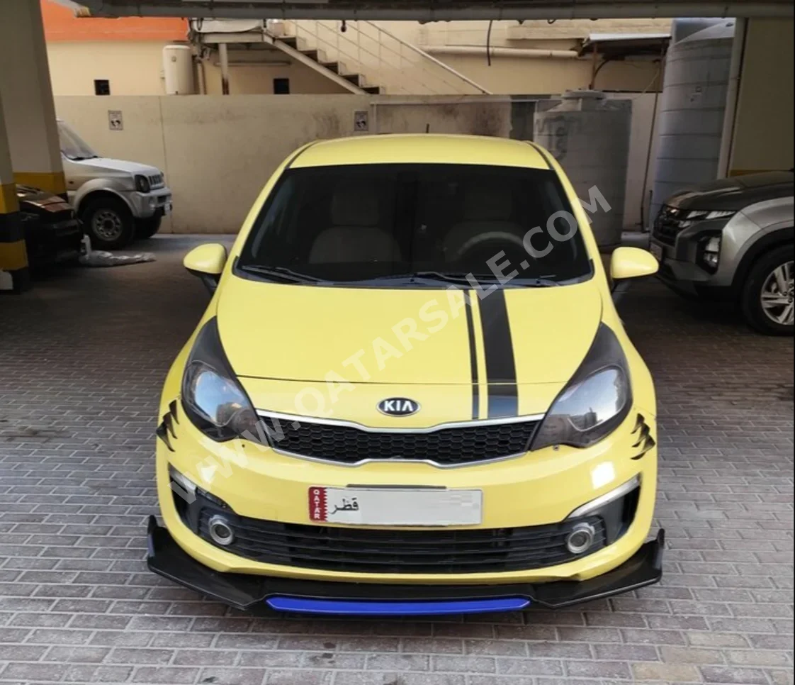 Kia  Rio  2017  Automatic  190,000 Km  4 Cylinder  Front Wheel Drive (FWD)  Hatchback  Yellow