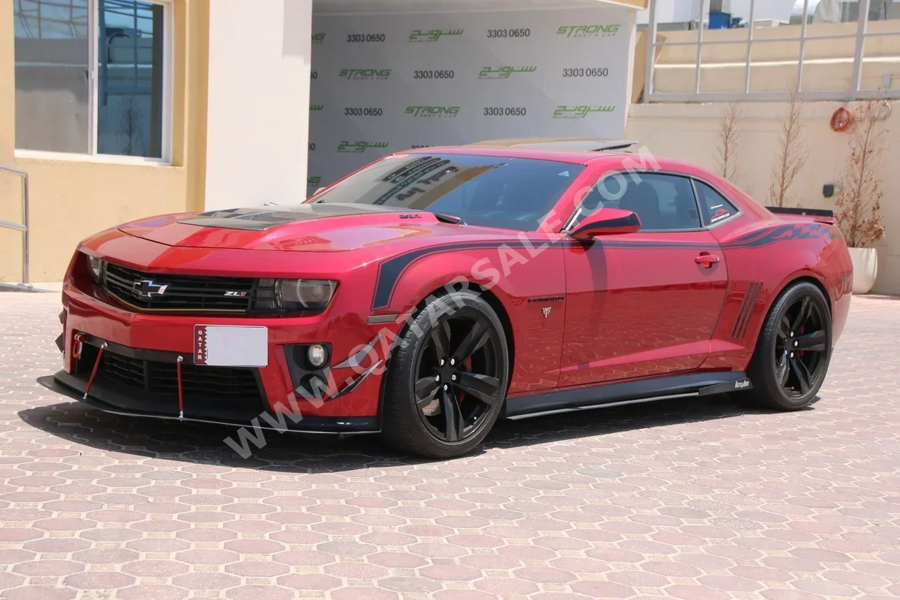 Chevrolet  Camaro  ZL1  2013  Automatic  139,000 Km  8 Cylinder  Rear Wheel Drive (RWD)  Coupe / Sport  Red