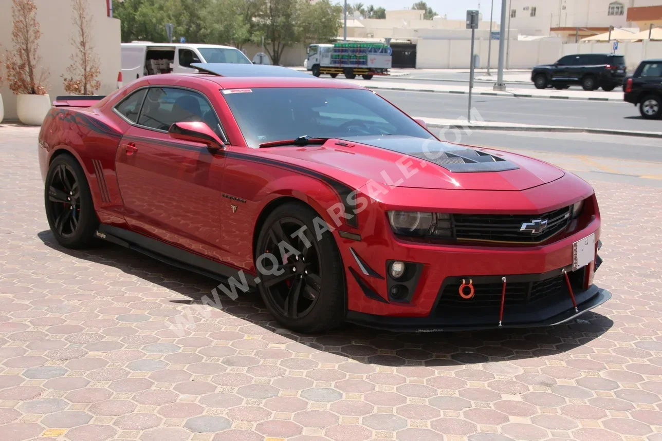 Chevrolet  Camaro  ZL1  2013  Automatic  139,000 Km  8 Cylinder  Rear Wheel Drive (RWD)  Coupe / Sport  Red