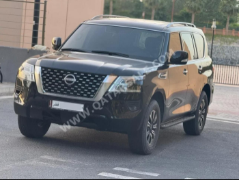 Nissan  Patrol  SE  2023  Automatic  38,000 Km  6 Cylinder  Four Wheel Drive (4WD)  SUV  Black  With Warranty