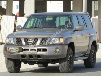 Nissan  Patrol  Super Safari  2019  Automatic  224,900 Km  6 Cylinder  Four Wheel Drive (4WD)  SUV  Gold