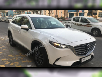 Mazda  CX 9  4 Cylinder  SUV 4x4  White  2023
