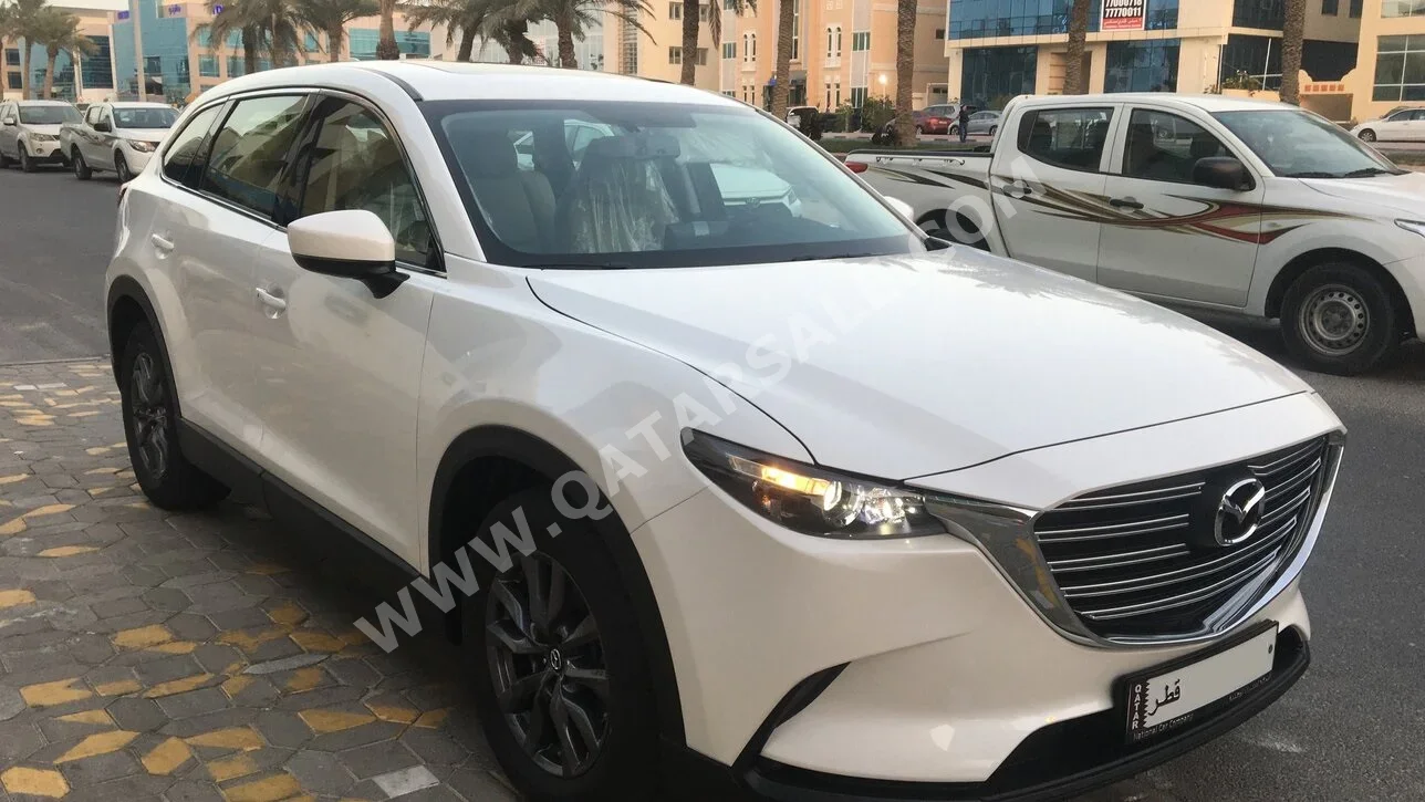 Mazda  CX 9  4 Cylinder  SUV 4x4  White  2023
