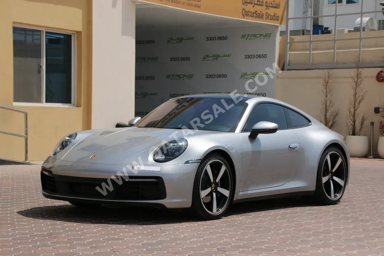 بورش  911  كاريرا  2023  اوتوماتيك  5,500 كم  6 سلندر  دفع خلفي  كوبيه \ سبورت  فضي  تحت الضمان