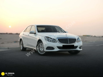 Mercedes-Benz  E-Class  200  2014  Automatic  58,000 Km  4 Cylinder  Rear Wheel Drive (RWD)  Sedan  White