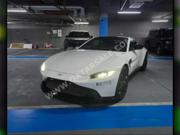 Aston Martin  Vantage  2019  Automatic  34,000 Km  8 Cylinder  Rear Wheel Drive (RWD)  Coupe / Sport  White
