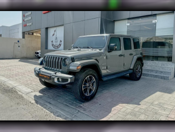 Jeep  Wrangler  Sahara  2023  Automatic  26,000 Km  6 Cylinder  Four Wheel Drive (4WD)  SUV  Gray Metallic  With Warranty