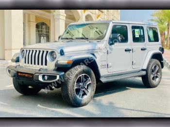 Jeep  Wrangler  Sahara  2023  Automatic  26,000 Km  6 Cylinder  Four Wheel Drive (4WD)  SUV  Gray Metallic  With Warranty
