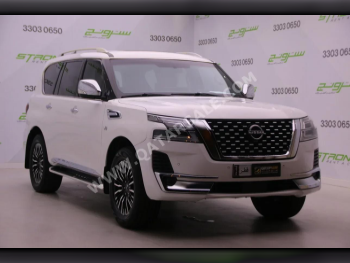 Nissan  Patrol  Platinum  2013  Automatic  79,000 Km  8 Cylinder  Four Wheel Drive (4WD)  SUV  Pearl