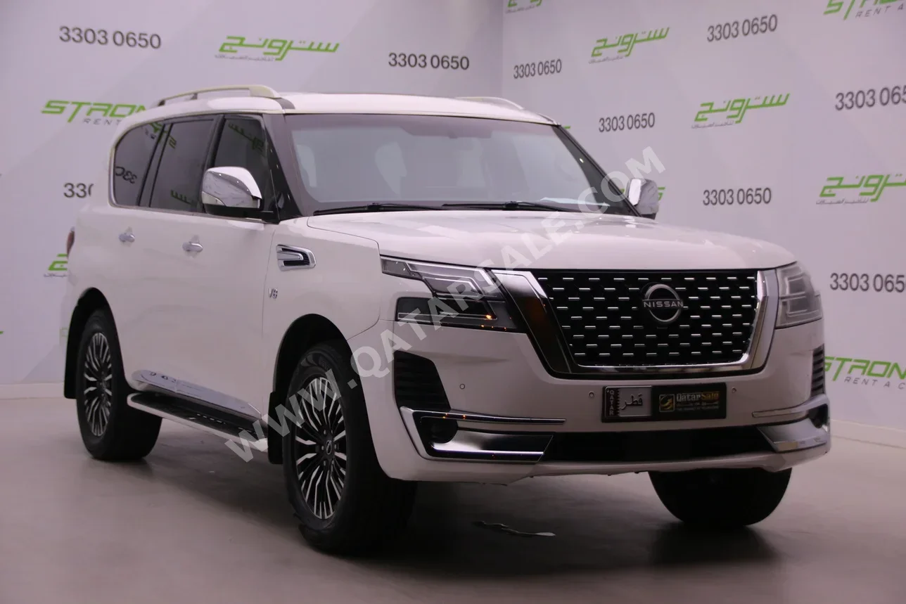 Nissan  Patrol  Platinum  2013  Automatic  79,000 Km  8 Cylinder  Four Wheel Drive (4WD)  SUV  Pearl