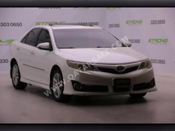 Toyota  Camry  GLX  2013  Automatic  325,000 Km  4 Cylinder  Front Wheel Drive (FWD)  Sedan  Pearl
