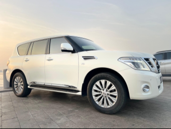 Nissan  Patrol  LE Titanium  2018  Automatic  65,000 Km  8 Cylinder  Four Wheel Drive (4WD)  SUV  White