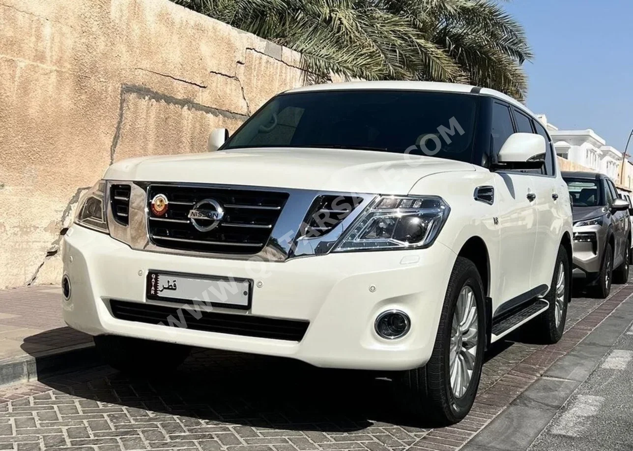 Nissan  Patrol  LE Titanium  2018  Automatic  65,000 Km  8 Cylinder  Four Wheel Drive (4WD)  SUV  White