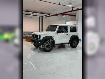 Suzuki  Jimny  2023  Manual  30,000 Km  4 Cylinder  Four Wheel Drive (4WD)  SUV  White  With Warranty