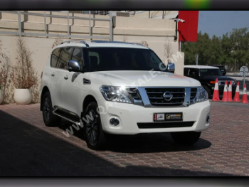 Nissan  Patrol  Platinum  2019  Automatic  97,000 Km  6 Cylinder  Four Wheel Drive (4WD)  SUV  White