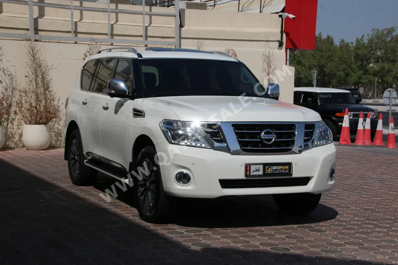 Nissan  Patrol  Platinum  2019  Automatic  97,000 Km  6 Cylinder  Four Wheel Drive (4WD)  SUV  White
