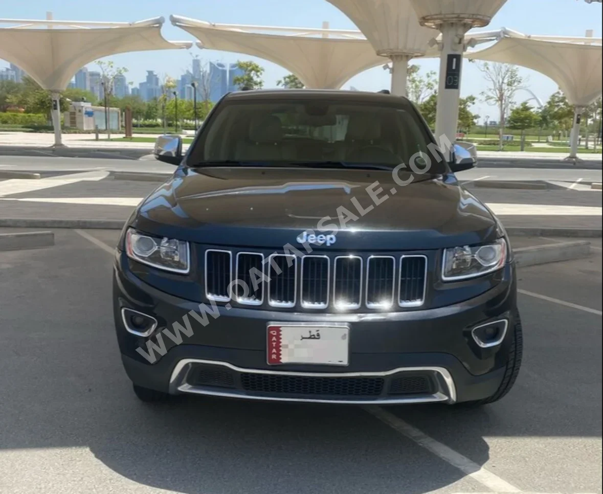 Jeep  Grand Cherokee  Limited  2014  Automatic  250,000 Km  6 Cylinder  Four Wheel Drive (4WD)  SUV  Black and Beige