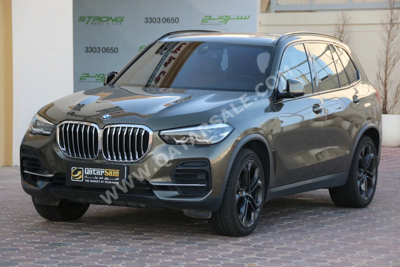 BMW  X-Series  X5  2023  Automatic  64,000 Km  6 Cylinder  Four Wheel Drive (4WD)  SUV  Bronze  With Warranty