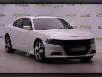 Dodge  Charger  RT  2016  Automatic  133,000 Km  8 Cylinder  Rear Wheel Drive (RWD)  Sedan  White