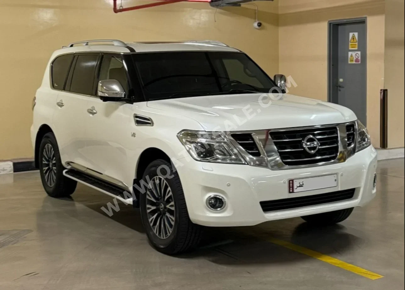 Nissan  Patrol  Platinum  2015  Automatic  218,000 Km  8 Cylinder  Four Wheel Drive (4WD)  SUV  White