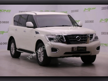 Nissan  Patrol  SE  2014  Automatic  305,000 Km  8 Cylinder  Four Wheel Drive (4WD)  SUV  White