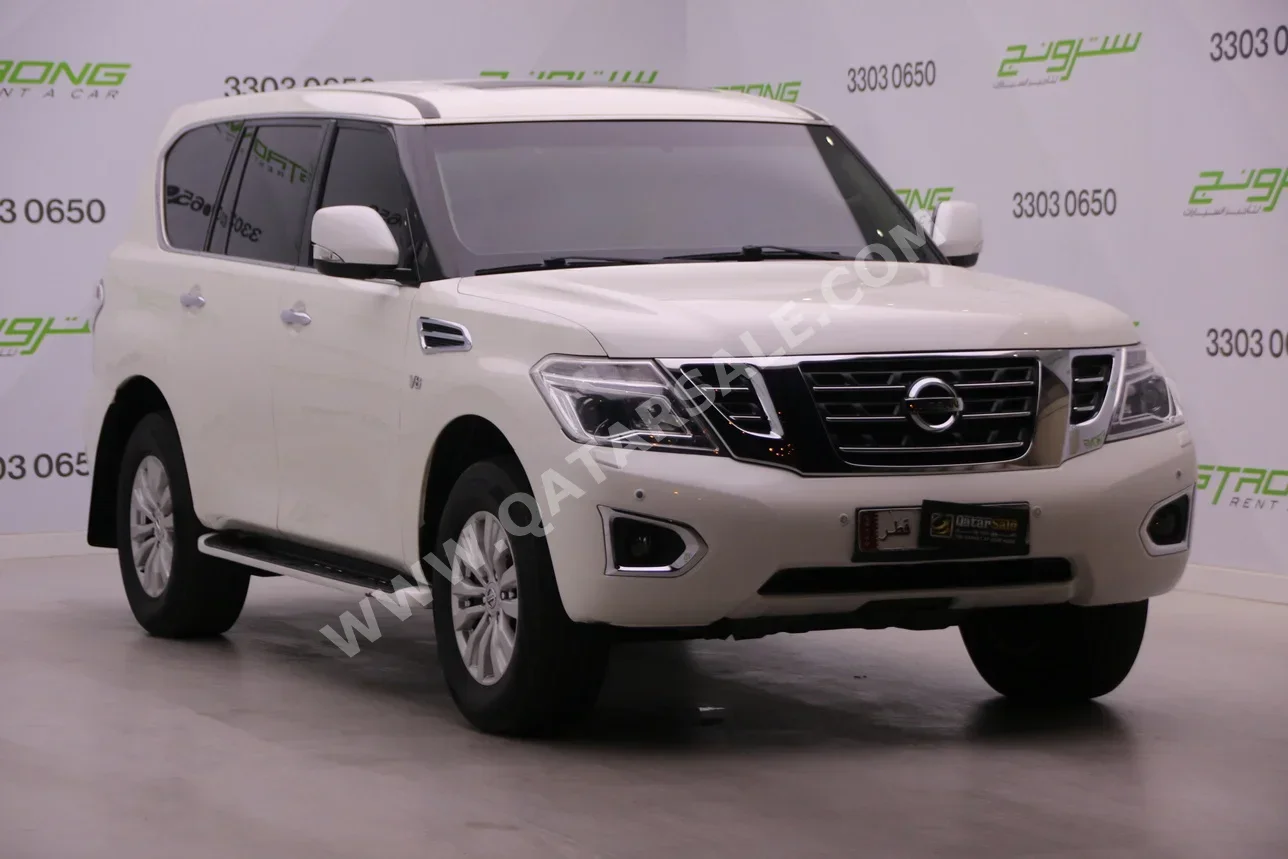 Nissan  Patrol  SE  2014  Automatic  305,000 Km  8 Cylinder  Four Wheel Drive (4WD)  SUV  White