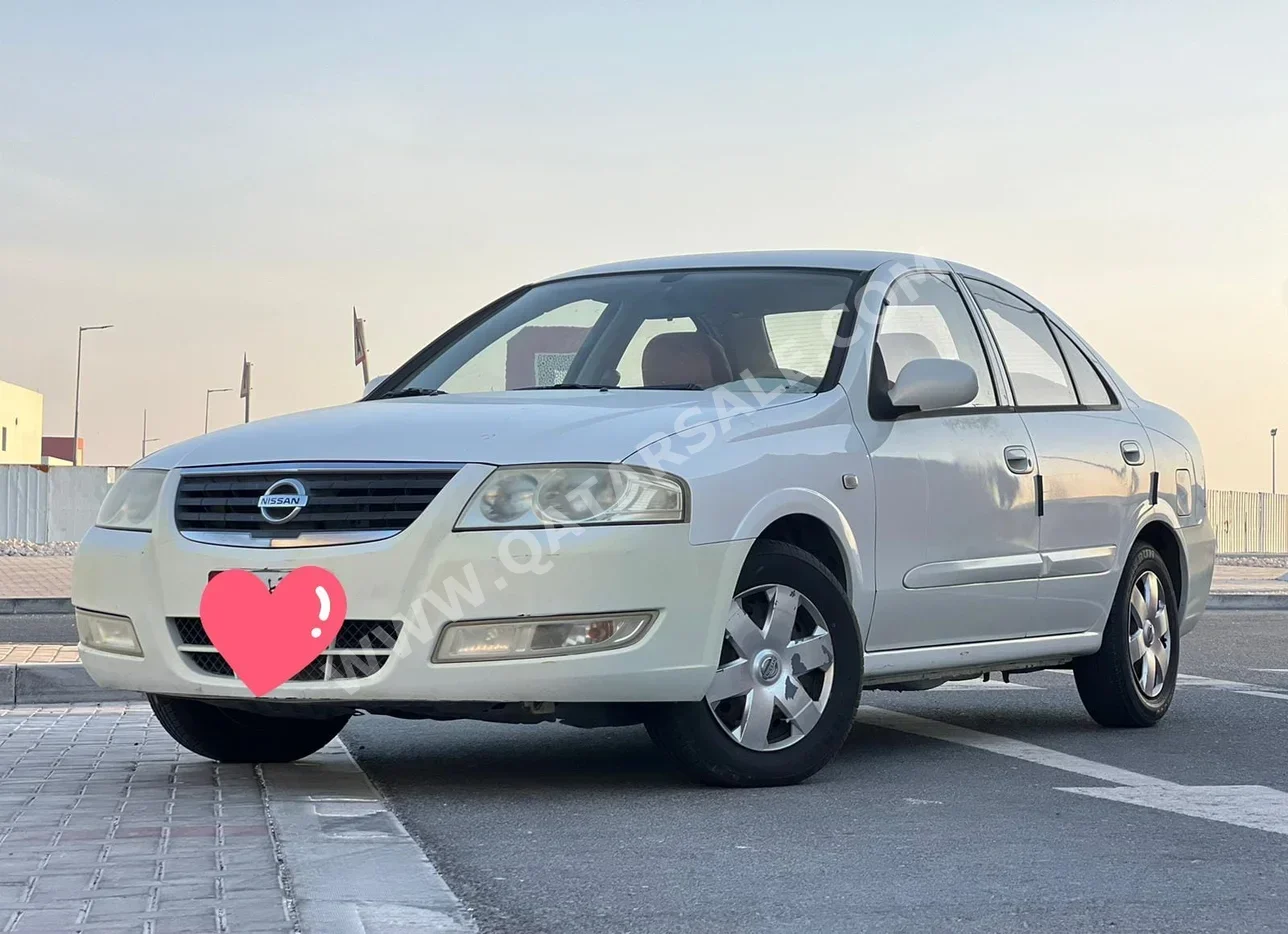 Nissan  Sunny  2012  Automatic  229,000 Km  4 Cylinder  Front Wheel Drive (FWD)  Sedan  White