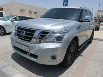 Nissan  Patrol  Platinum  2015  Automatic  234,000 Km  8 Cylinder  Four Wheel Drive (4WD)  SUV  Silver