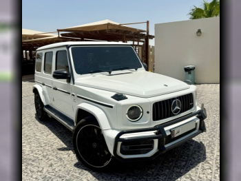 مرسيدس - بنز  جي - كلاس  63 اي ام جي  2021  اوتوماتيك  58,028 كم  8 سلندر  دفع رباعي  اس يو في  أبيض و أسود  تحت الضمان