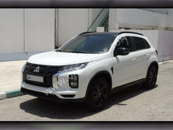 Mitsubishi  ASX  2022  Automatic  20,000 Km  4 Cylinder  Front Wheel Drive (FWD)  SUV  White  With Warranty