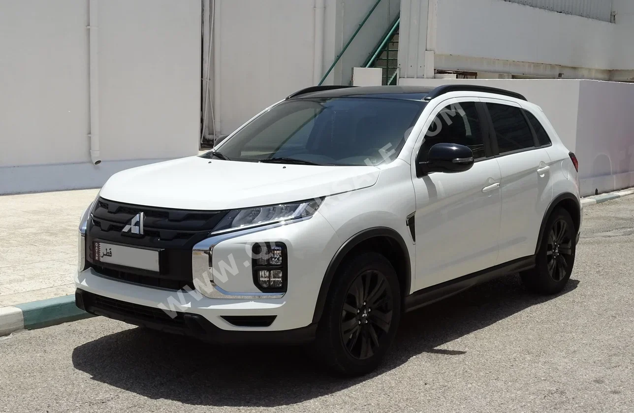 Mitsubishi  ASX  2022  Automatic  20,000 Km  4 Cylinder  Front Wheel Drive (FWD)  SUV  White  With Warranty