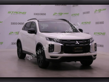 Mitsubishi  ASX  2024  Automatic  16,000 Km  4 Cylinder  Front Wheel Drive (FWD)  SUV  White  With Warranty