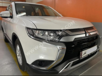 Mitsubishi  Outlander  2021  Automatic  62,600 Km  4 Cylinder  Four Wheel Drive (4WD)  SUV  White